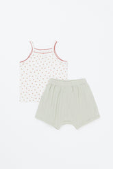 Flat lay of Avauma floppy baby tank set – floral print sleeveless top with sage green shorts